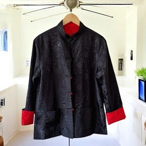 This jacket is a Chinese-style jacket, often referred to as a Tangzhuang